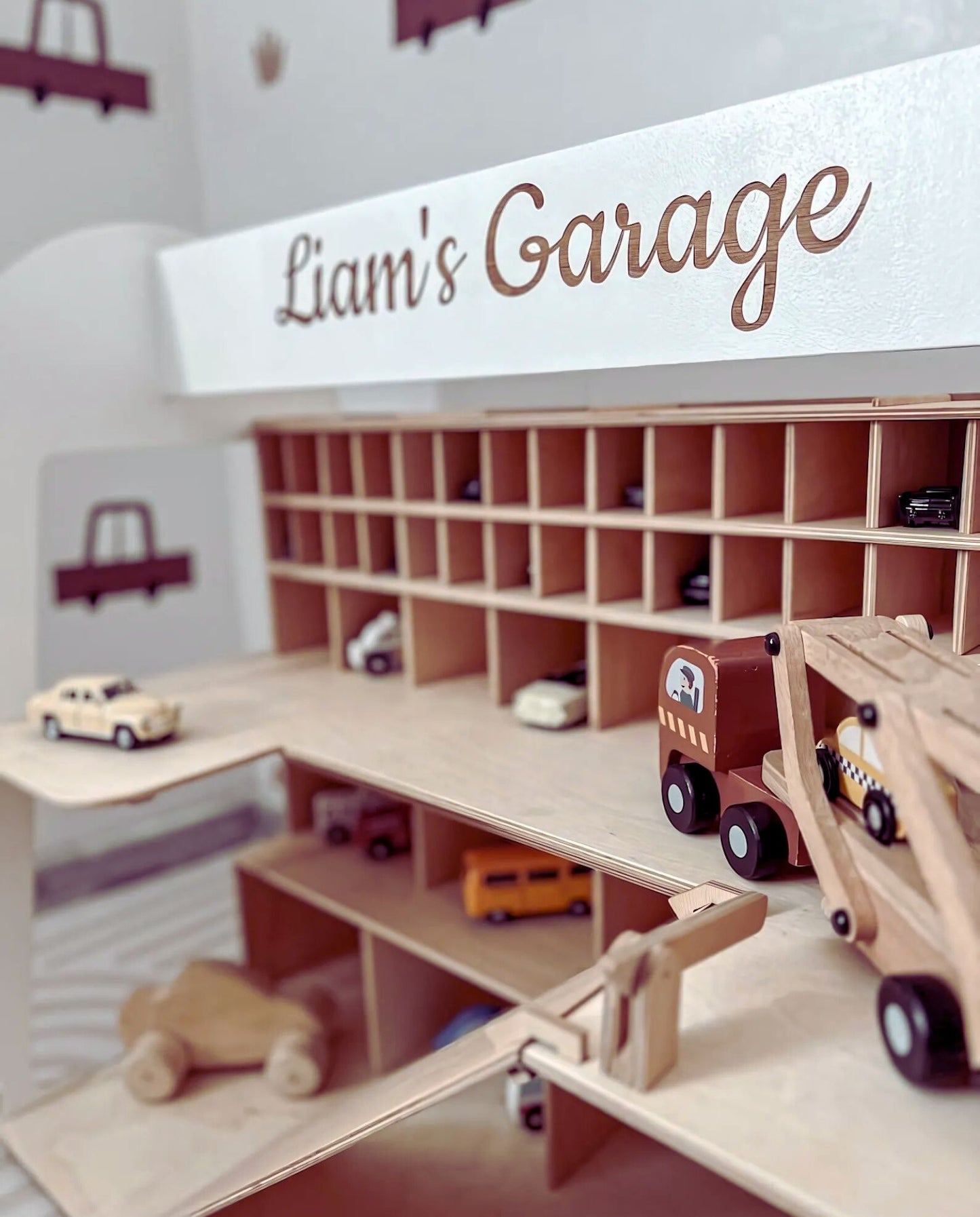Personalized wooden car ramp garage for toy car storage in Montessori-style rooms