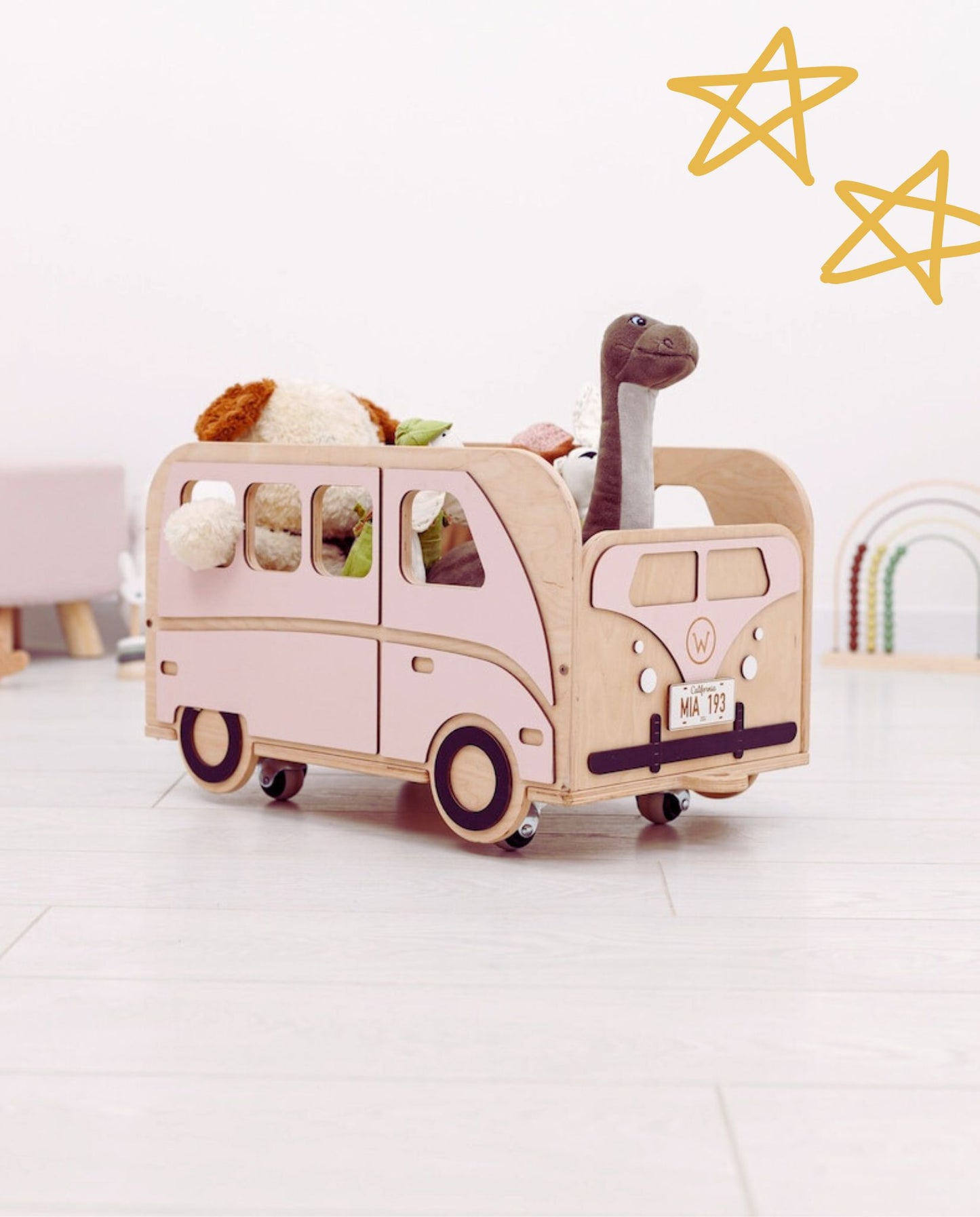 Montessori-inspired handmade wooden toy car garage in a cozy child’s room with neutral decor
