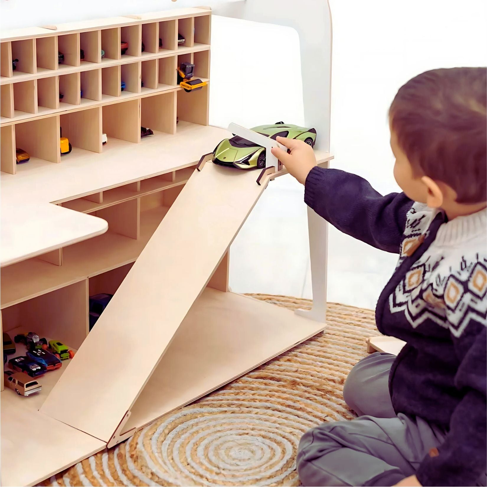 Child playing with Montessori ramp-style wooden toy car garage – great for 2-6 year olds
